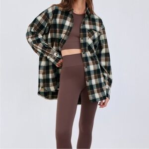 EUC The Group by Babaton Bricker Button-Up